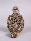 A CHINESE WHITE METAL OPENWORK SNUFF BOTTLE, with decoration in openwork and depicting immortal