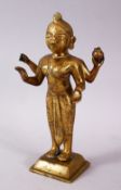A 19TH / 20TH CENTURY INDIAN BRONZE FIGURE OF A DEITY, stood holding a vessel with plated hair, 20cm