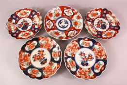 FIVE JAPANESE MEIJI PERIOD IMARI PORCELAIN PLATES, two pairs and a single, of similar decoration