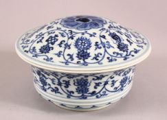 A CHINESE BLUE & WHITIE PORCELAIN LOTUS BOWL & COVER, decorated with lotus, interior of lid and bowl