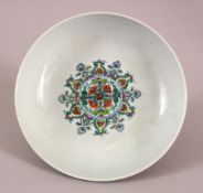 A CHINESE DOUCAI DISH decorated with lotus, yong zheng mark to base, 18cm diameter.