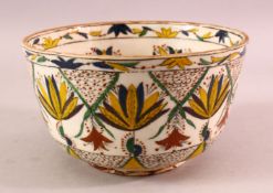 A TURKISH OTTOMAN 18TH CENTURY KUTAHYA POTTERY BOWL, with leaf pattern upon white glaze, 19cm.