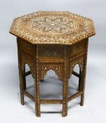 A GOOD MOORISH BONE INLAID OCTAGONAL TABLE with folding base, 62cm diameter, 62cm high.