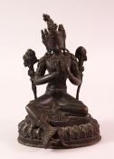 A 19TH CENTURY INDIAN BRONZE FIGURE OF SHIVA / DEITY, in a seated pose with hands together, upon
