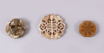 THREE CHINESE CARVED JADE PENDANTS, One carved in the form of TWIN BATS AND SYMBOLS, 6.5cm, one