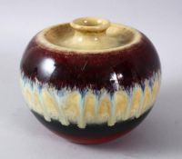 A CHINESE FLAMBE DRIP GLAZED PORCELAIN VASE, with graduating colour palate with a central drip