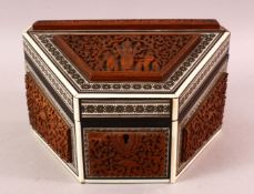 AN INDIAN CARVED WOOD & INLAID IVORY & EBONY LIDDED BOX, carved with figures and birds amongst
