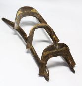 A LATE 19TH CENTURY WROUGHT IRON AND WOOD CAMEL SEAT, approx. 130cm long.