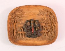 A SMALL JEWISH TERRACOTTA FIGURAL DISH, depicting three seated figures, 17cm x 14cm