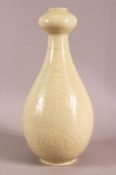 A CHINESE SONG / DING STYLE CARVED PORCELAIN VASE, with scraffito decoration, 34cm