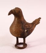 A 19TH CENTURY PERSIAN IRON BIRD FIGURE, with traces of gilt to wings, 12cm high.