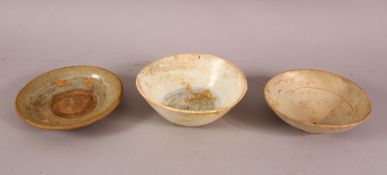 THREE EARLY CHINESE POTTERY BOWLS, of varying style and size (3)