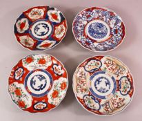 FOUR JAPANESE MEIJI PERIOD IMARI PORCELAIN PLATES, each with varying decoration in typical palate,