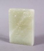 A CHINESE CARVED JADE PENDANT - IMMORTAL, the figure in a landscape setting with blossom and
