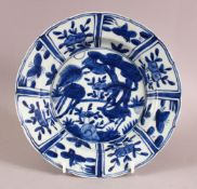 A CHINESE BLUE & WHITE PORCELAIN PLATE, kraak style, depicting deer in landscapes, 22cm