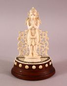 A 19TH CENTURY INDIAN CARVED IVORY VIZAGAPATUM FIGURE OF HANUMAN, 11cm high.