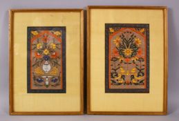 A PAIR OF INDIAN MINIATURE FRAMED PAINTINGS, each decorated with displays of native flora, one