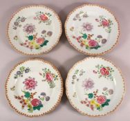 A SET OF FOUR 18TH / 19TH CENTURY CHINESE FAMILLE ROSE PLATES, with floral decoration, 23cm
