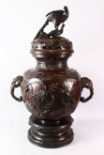 A JAPANESE MEIJI BRONZE RELIEF THREE PIECE VASE POS, the body with relief work of birds and flora