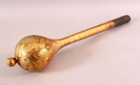 A TURKISH OTTOMAN GILDED METAL MACE, with chased decoration and a wooden handle, 51cm