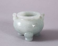 A MINIATURE CARVED TWO HANDLED JADITE CENSER, 5cm diameter.
