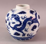 A 19TH CENTURY CHINESE BLUE & WHITE PORCELAIN DRAGON VASE, decorated with dragons, clouds and