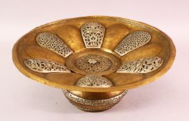 AN INDIAN SILVER INLAID BRASS BASIN, with pierced removable cover, 31cm diameter.