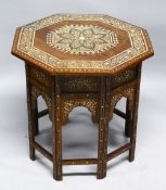 A GOOD MOORISH BONE INLAID OCTAGONAL TABLE with folding base, 62cm diameter, 62cm high.