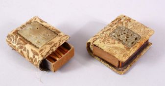 TWO CHINESE CARVED JADE INSET MATCH BOX HOLDERS, each inset with a small carved jade pendant, two
