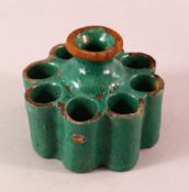 A MORROCAN / FEZ POTTERY INK STAND, with a green glaze, 11.5cm