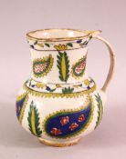 AN OTTOMAN KUTAHYA POTTERY JUG, with floral motif decoration, 12cm