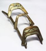A LATE 19TH CENTURY BRASS, WROUGHT IRON AND WOOD CAMEL SEAT, approx. 138cm long.