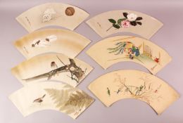 SEVEN JAPANESE 20TH CENTURY WOODBLOCK FAN SHAPED PRINTS, depicting puppys, birds, fruits, flora