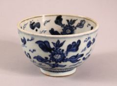 A SMALL CHINESE BLUE AND WHITE BOWL, painted with fish and flora, 12cm diiameter, 7.5cm high.