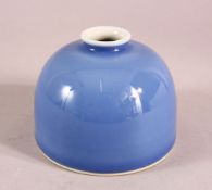 A CHINESE SKY BLUE GLAZED PORCELAIN BRUSH WASH, in kangxi style, base with six character mark. 10cm