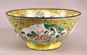 A GOOD CHINESE CANTON ENAMEL BOWL, decorated with panels of birds and flora with a yellow