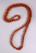 A RARE SET OF 19TH CENTURY CHINESE CARVED EXOTIC WOOD ROSARY BEAD NECKLACE, comprising 103 carved