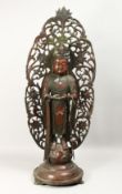 A LARGE BRONZE GOD FIGURE with halo, 32ins high.