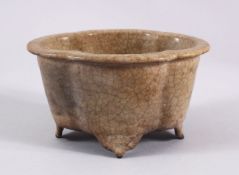 A CHINESE CRACKLE GLAZED GE STYLE PLANT POT, stood on four feet, 9cm high x 15.5cm wide.