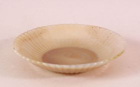 A FINE INDIAN CARVED WHITE JADE PETAL FORMED DISH, with ribbed body to simulate petal, 13cm