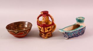 THREE NORTH AFRICAN POTTERY ITEMS, including a circular bowl and two lamps (3).