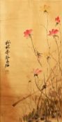 A CHINESE SCROLL PAINTING OF FLORAL DISPLAY, with a wooden batten, signed to the mid left section,