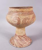 AN EARLY THAI BAN CHIANG POTTERY PEDESTAL VASE, with orange swirling motif, 19.5cm high x 15cm