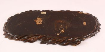 A LARGE CHINSE CARVED HARDWOOD STAND, of naturalistic form, 73cm wide x 33cm