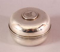 A WHITE METAL INSET CALLIGRAPHIC COIN CYLINDRICAL BOX AND COVER, the top with in inlaid coin with