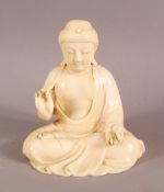 A JAPANESE MEJI PERIOD CARVED IVORY OKIMONO OF BUDDHA in a seated meditation position, the base with