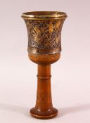 A GOOD ISLAMIC GOLD & SILVER INLAID HUQQA BASE, with wooden top, with gold and silver inlays