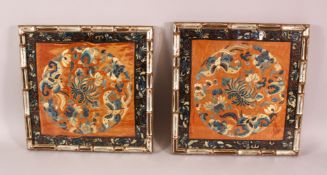 A PAIR OF 19TH CENTURY CHINESE EMBROIDERED SILK PANELS, with butterflies and flora, framed, 34cm