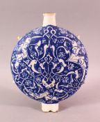 A TURKISH IZNIK BLUE & WHITE POTTERY WATER FLASK, with floral decoration, 23cm