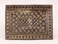 A 19TH CENTURY INDIAN SILVER INLAID BRONZE TRAY, inlaid with silver leaf motif, 23cm